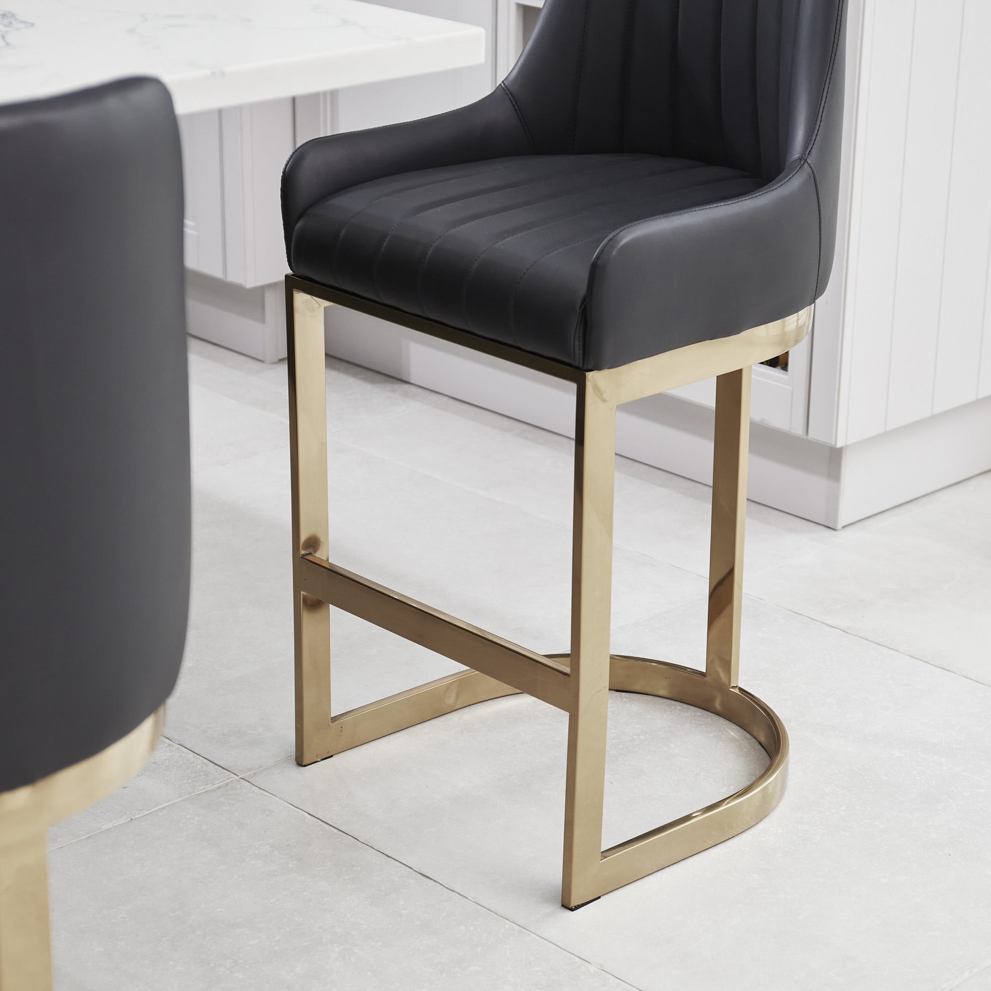 Clara Black Upholstery Counter Stool with Gold Steel Frame