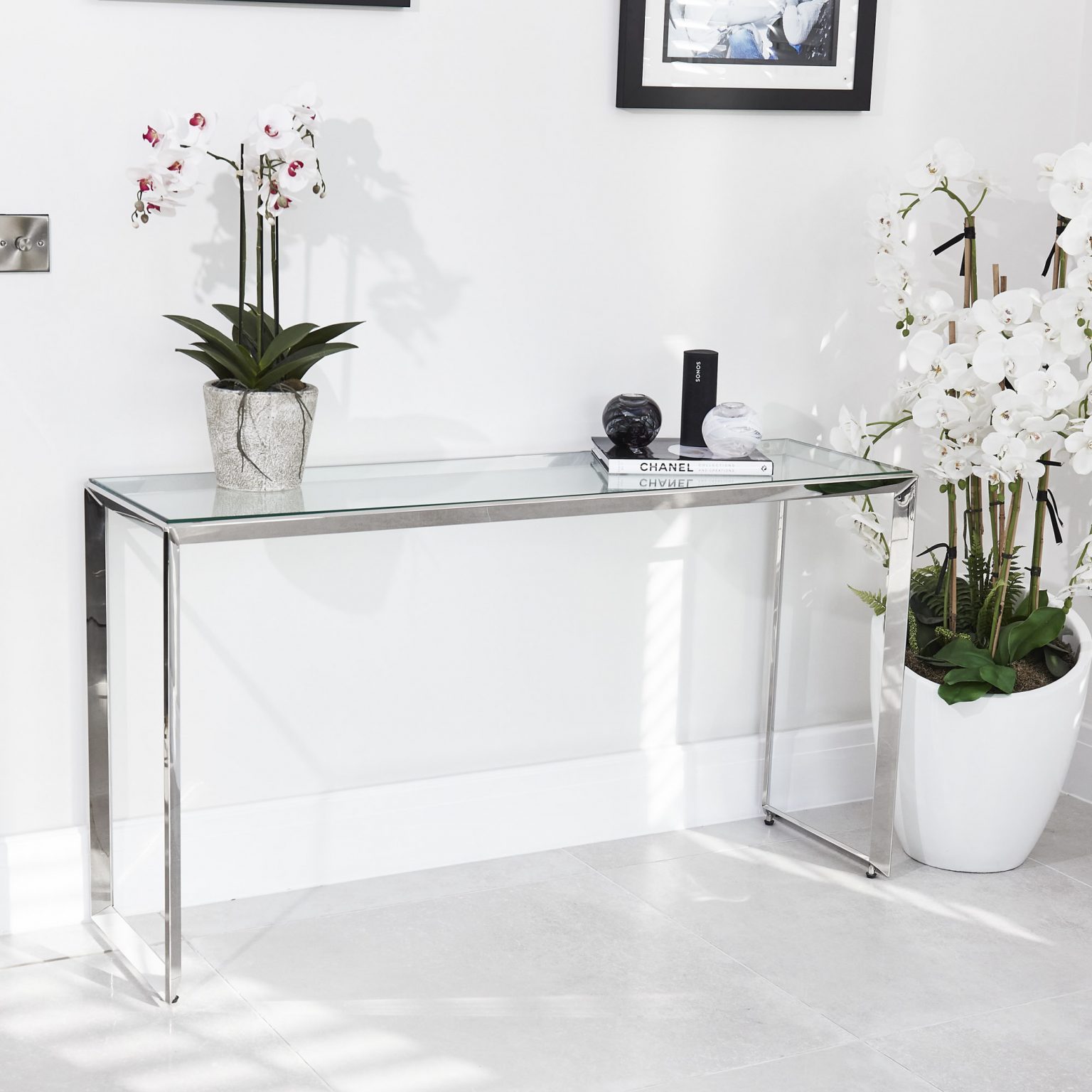 Small Glass Console Table With Polished Stainless Steel Grosvenor Furniture