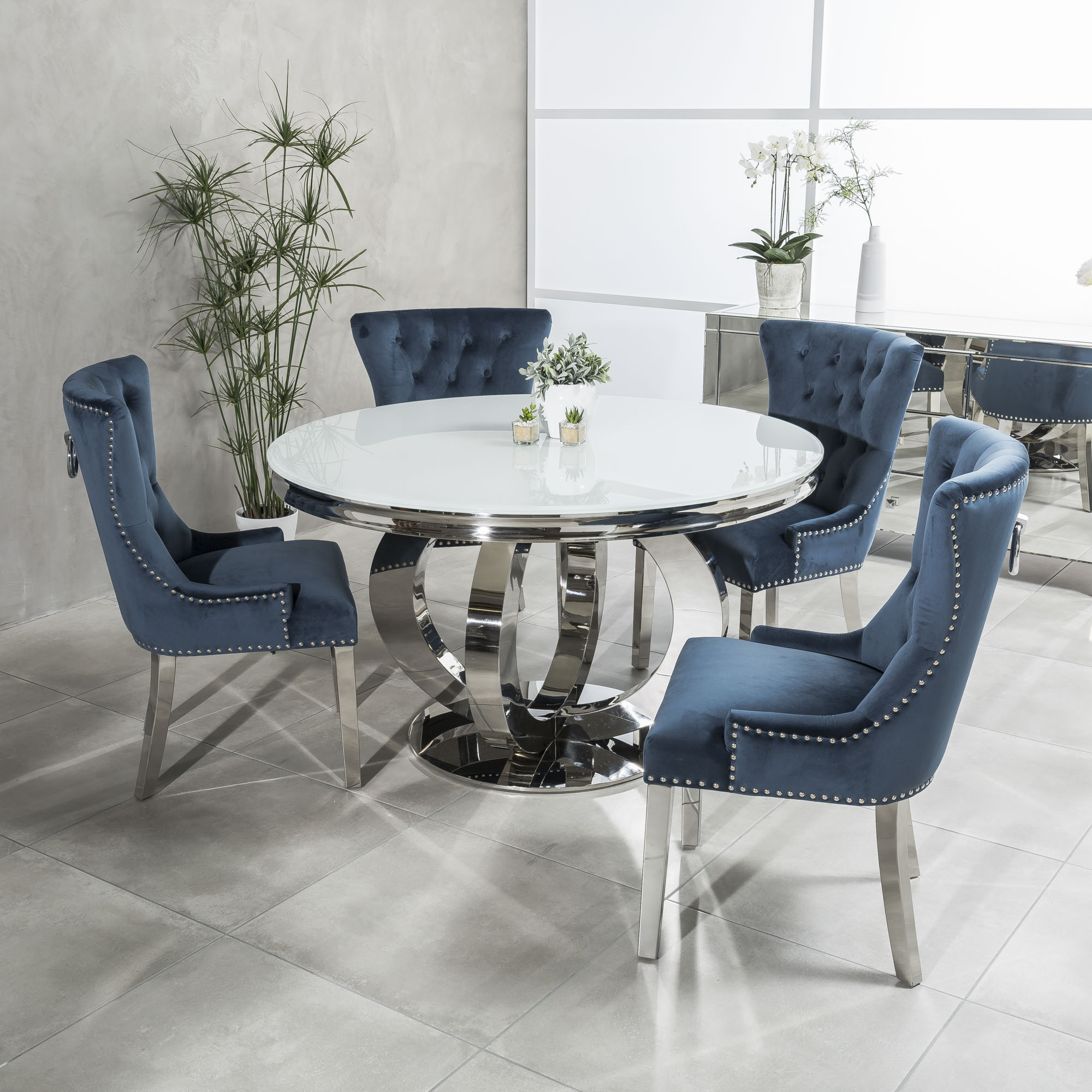 1.3m Circular Polished Steel Dining White Glass Table Set with 4 Royal Blue Brushed Velvet Dining Chairs