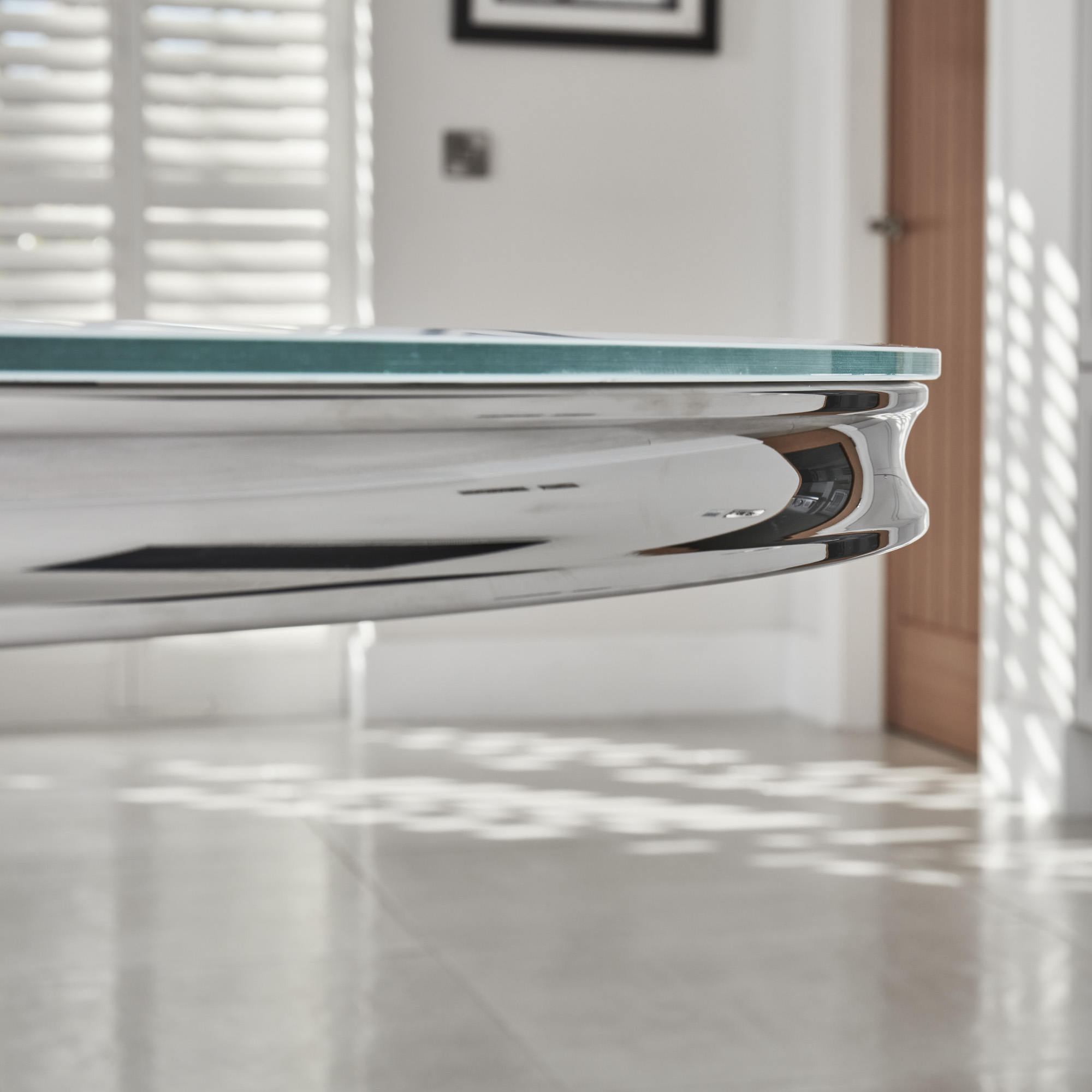 1.3m Round Glass Dining Table in White With Polished Steel Base
