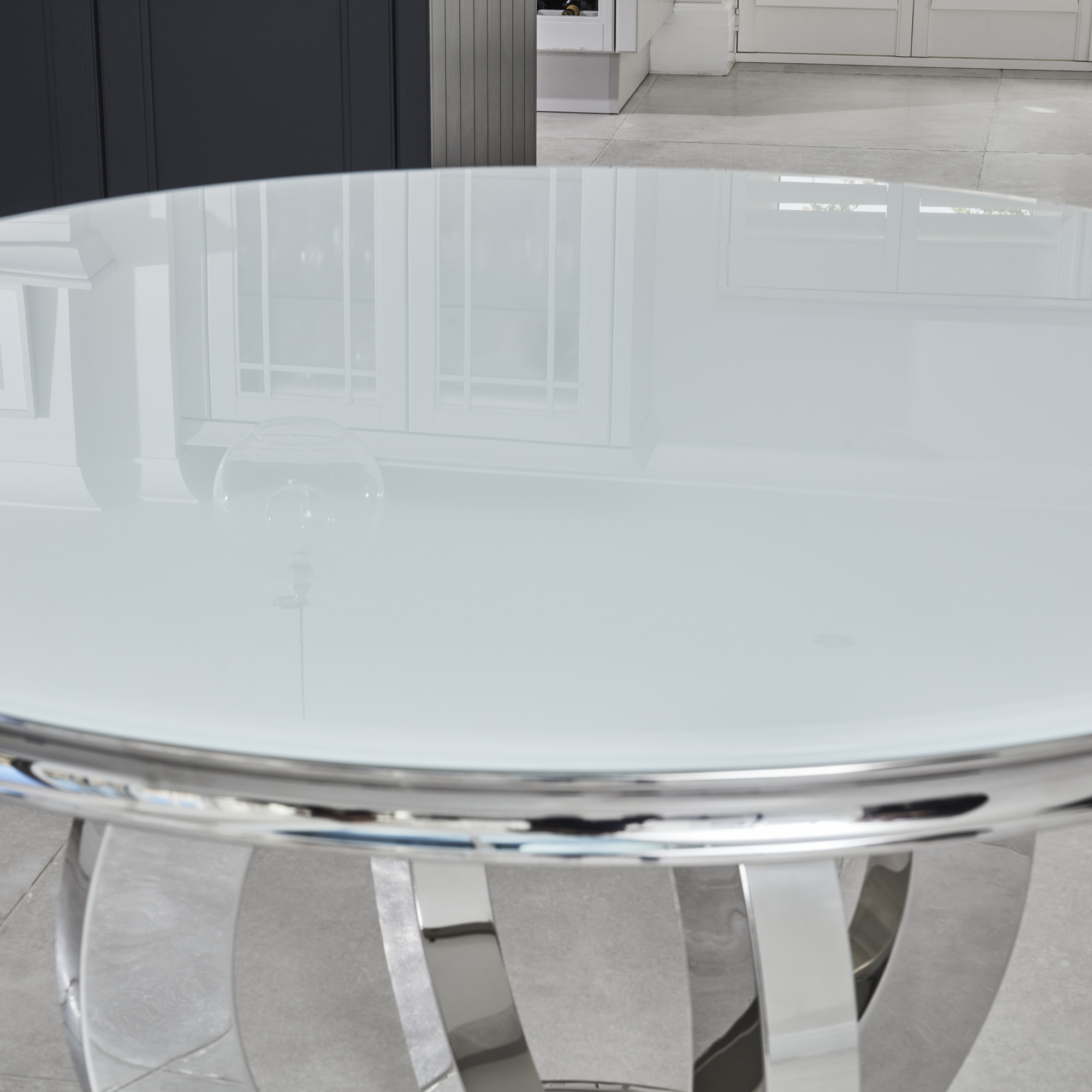 1.3m Round Glass Dining Table in White With Polished Steel Base